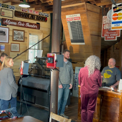 Here is a photo of a group at the filming of a commercial.