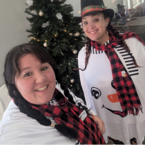 Here is a photo of Evart Northland employees posing for a selfie at the Evart Santa Meet and Greet Event.