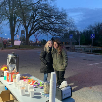 Here is Jenn and Maisey from Alpena Northland passing our hot chocolate at an event 